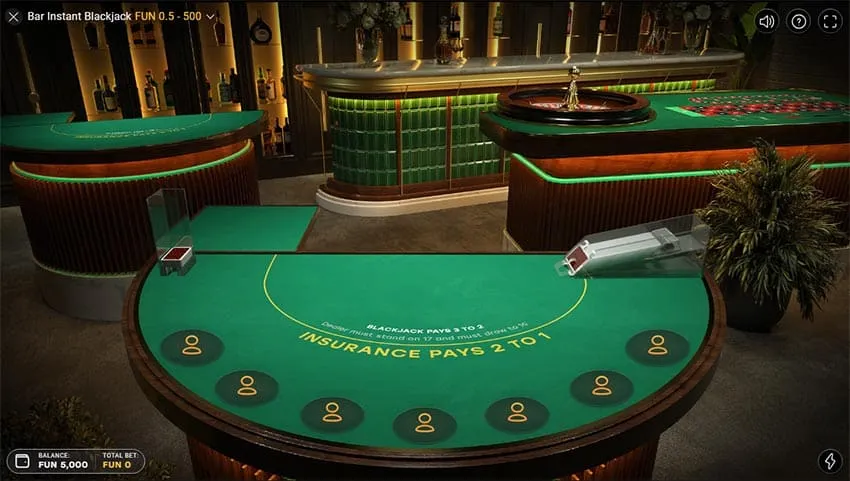Bar Instant Blackjack table in the Bar studio with seven empty seats, lit bottle shelves and a green glass counter